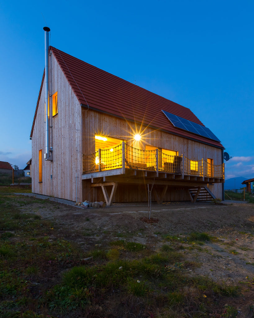 rustic home with solar panels